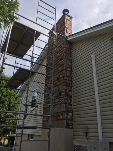 large chimney repair in progress